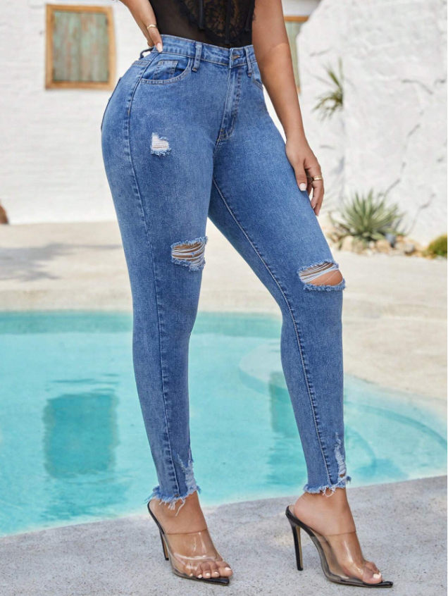 Stylish Comfort: Distressed Curvy Jeans For Women - Medium Wash